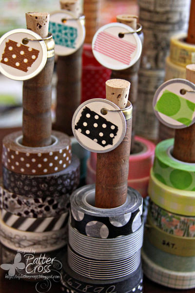 organizing spools of washi tape with vintage wooden spools